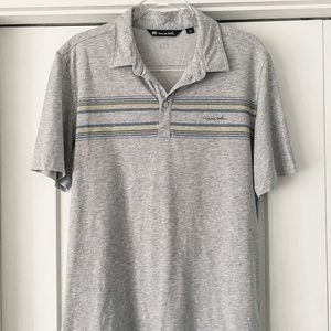 Gray Travis Mathew golf polo with yellow and blue stripe